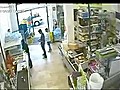 Cashier Ignores Robber