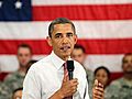 Obama visits troops amid Afghan pullout grumbles