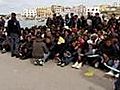 Berlusconi vows to clear migrants