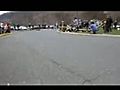 Longboarder crashes into spectators