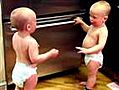 Baby babble! Twin boys chat up a storm