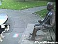 Dog Tries To Play With Statue