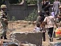 吉爾吉斯臨時總統估計騷亂多達2000人死亡