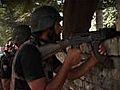 Scores Dead As Militants Ambush Pakistan Police
