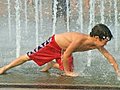 Boy Playing In Fountain Stock Footage