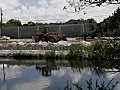 Royalty Free Stock Video SD Footage Heavy Equipment Loader Operates on a Road Construction Project in Ft. Lauderdale,  Florida