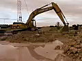 Royalty Free Stock Video SD Footage Heavy Equipment Digger Operates at a Construction Site in Ft. Lauderdale,  Florida