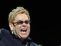 Sir Elton introduces world to new baby