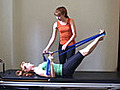 Pilates Leg Bend and Stretch With Exercise Band