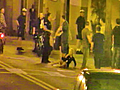 Surveillance video: Woman pushed by OPD officer