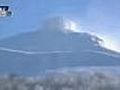 Snowboarders in avalanche