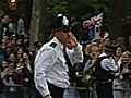 Royal wedding policeman entertains crowds as they wait for Prince William and Kate