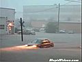 Scooter Plows Through Flood