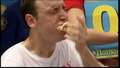 Hot dog champ stuffs his face to win