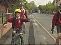 Watch                                     Brothers who unicycle to school