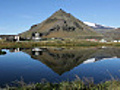 HD Video Iceland lake reflections of volcano and fishing village