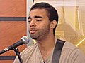 Musician Levi Schmidt performs on NECN