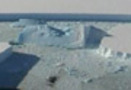 Massive ice shelf collapsing off Antarctica
