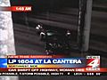 Woman dies in car swept off highway