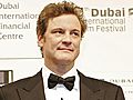 Colin Firth speaks on set