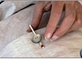 How to Sew a Button with a Shank
