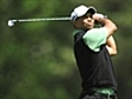 Woods struggles as Molinari leads