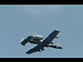 Royalty Free Stock Video SD Footage A-10 Warthog Military Jet Aircraft Flies By at the Air Show on Ft. Lauderdale Beach in Florida