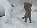 1 storm dumps ice and snow in 2 regions