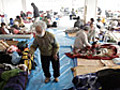 Japan’s tsunami survivors gather in shelter - video