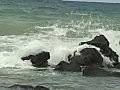 Royalty Free Stock Video SD Footage Waves Crash Against Rocks on South Coastline Near Hana in Maui,  Hawaii