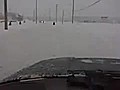 Man Riding On Scooter in Snow Storm.&#32;&#32;London Ontario,  Canada (Dec 6, 2010)