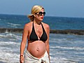 Tori Spelling’s Baby Bump Bikini