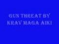 compete against Gun threat by krav maga aiki