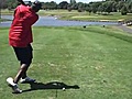 UIC basketball coach Howard Moore tees off.