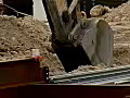 Royalty Free Stock Video SD Footage Heavy Equipment Digger Operates at a Construction Site in Ft. Lauderdale,  Florida