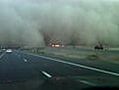 Raw: Driving into dust storm
