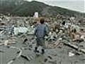 Families search rubble in Japan for loved ones