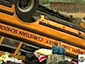 School bus collides with Cadillac,  23 injured