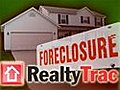 Foreclosures slow,  but huge backlog remains
