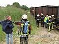 1persoon beknelt tussen wagon en locomotief.oefening 18.6.2010