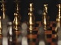 Close-up of hand playing chess,  dolly shot