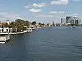 Royalty Free Stock Video HD Footage Pan to Right of Buildings on Las Olas Blvd,  Blimp and Waterway in Fort Lauderdale, Florida