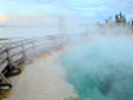 Steam and boardwalk by a geyser