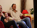 Family watching funny movie