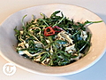 Homemade pasta with garlic,  chilli and rocket