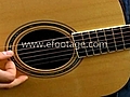 CLOSE-UP OF MAN PLAYING GUITAR - 1 - HD