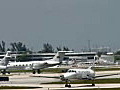 Royalty Free Stock Video HD Footage Private Turbo Prop Propeller Aircraft Taxi’s to the End of the Runway in Ft. Lauderdale,  Florida