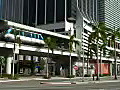 Royalty Free Stock Video HD Footage People Mover Transit Station and High Rise Condos,  Office Buildings as People Mover Car Arrives in Downtown Miami, Florida