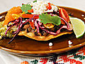 Chicken Tomatillo Tostadas with Refried Black Beans and Cabbage-Orange Slaw