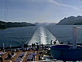 Royalty Free Stock Video SD Footage Zoom Out From Ships Wake to Cruise Ship Deck and Fog in the Inside Passage Waterway,  Alaska